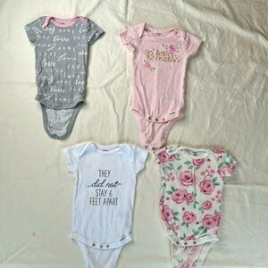 Bundle of 4 Gerber baby girl onesies. Size 3-6 months with “little princess”.